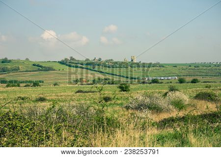 Train Heading From London To Southend Past Hadleigh Castle