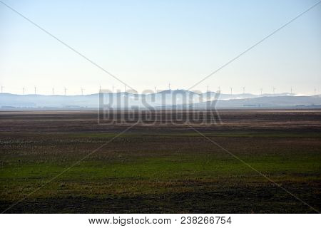Rural Wind Farms At Lake George In Australia. View Of Huge Wind Turbines Windmills. Lake George Is A