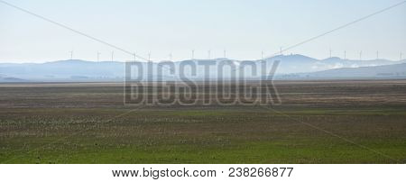 Rural Wind Farms At Lake George In Australia. View Of Huge Wind Turbines Windmills. Lake George Is A