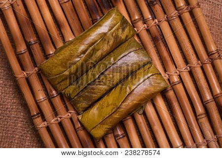 Top View Of Sticky Rice Wrapped In Leaves. Famous Cuisine In Borneo. Brunei, Sarawak And Sabah. Call