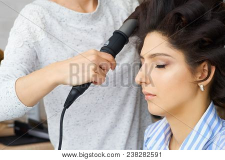 Fashion Hairdresser Doing Hairstyle To Young Woman Client Making Perm Professional Styler For Curl O
