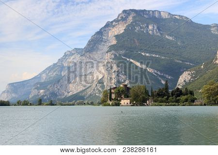 Castle Castel Toblino At Lake Lago Di Toblino And Mountain Panorama In Italy
