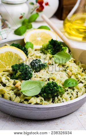 Traditional Pasta Tripoline With Pesto And Broccoli In A Plate On The Table. Selective Focus.