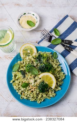 Traditional Pasta Tripoline With Pesto And Broccoli In A Plate On The Table. Selective Focus.