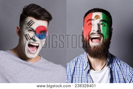 Emotional Soccer Fans With Painted South Korea And Mexico Flags On Faces. Confrontation Of Football 