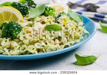 Traditional Pasta Tripoline With Pesto And Broccoli In A Plate On The Table. Selective Focus.