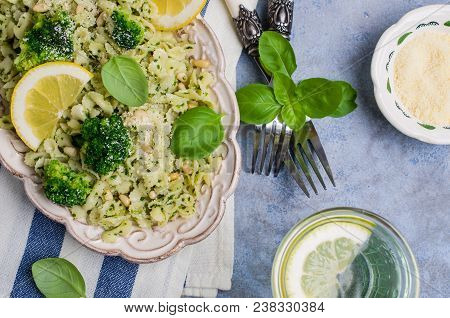 Traditional Pasta Tripoline With Pesto And Broccoli In A Plate On The Table. Selective Focus.