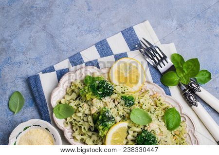 Traditional Pasta Tripoline With Pesto And Broccoli In A Plate On The Table. Selective Focus.