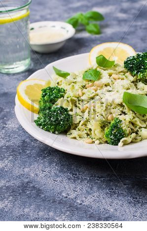 Traditional Pasta Tripoline With Pesto And Broccoli In A Plate On The Table. Selective Focus.