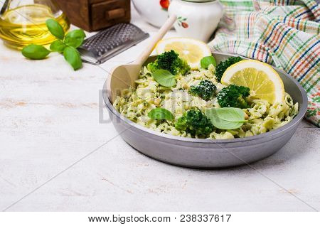 Traditional Pasta Tripoline With Pesto And Broccoli In A Plate On The Table. Selective Focus.