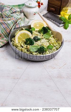 Traditional Pasta Tripoline With Pesto And Broccoli In A Plate On The Table. Selective Focus.