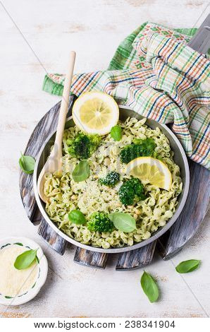 Traditional Pasta Tripoline With Pesto And Broccoli In A Plate On The Table. Selective Focus.