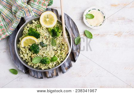 Traditional Pasta Tripoline With Pesto And Broccoli In A Plate On The Table. Selective Focus.