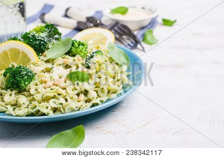 Traditional Pasta Tripoline With Pesto And Broccoli In A Plate On The Table. Selective Focus.