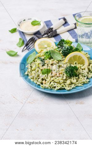 Traditional Pasta Tripoline With Pesto And Broccoli In A Plate On The Table. Selective Focus.