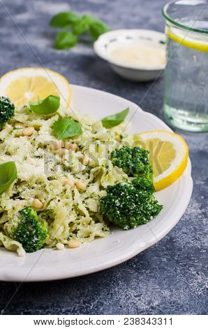 Traditional Pasta Tripoline With Pesto And Broccoli In A Plate On The Table. Selective Focus.
