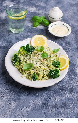 Traditional Pasta Tripoline With Pesto And Broccoli In A Plate On The Table. Selective Focus.