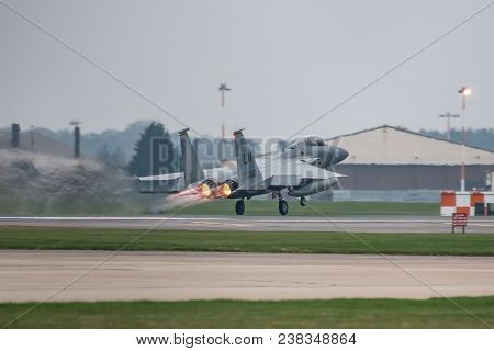 Raf Lakenheath, Uk - April 13, 2018: American Jet F-15 Take Off From Raf Lakenheath Base In A Grey F
