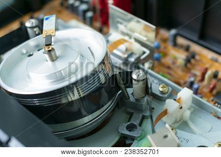 Videocassette Is Put Into The Video Recorder To Watch The Video, Another Video Cassette Is On The Vi
