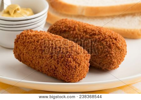 Deep fried Dutch kroketten and mustard for lunch