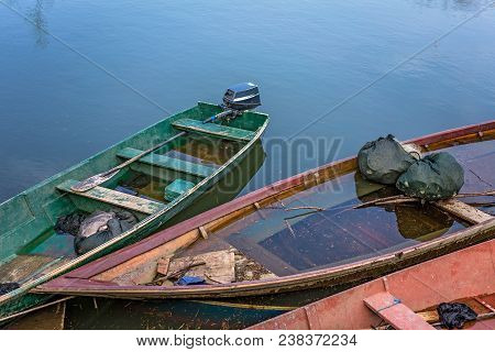 Neglected Empty Fisherman Boats On The Shore Of Lake Skadar In Virpazar, Montenegro