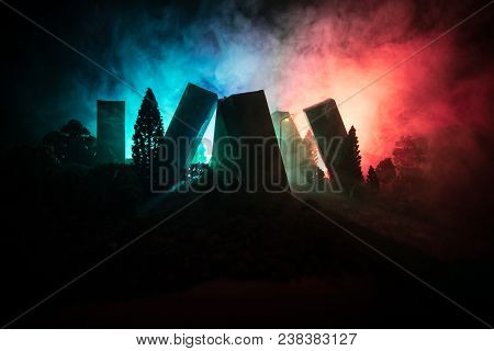 Empty Street Of Burnt Up City, Flames On The Ground And Blasts With Smoke In The Distance. Apocalypt