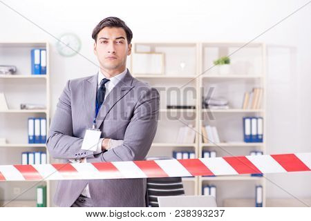 Forensics investigator at the scene of office crime