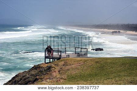 Tourists Looking At View At Lighthouse Beach. Port Macquarie, Australia Is A Popular Travel Destinat