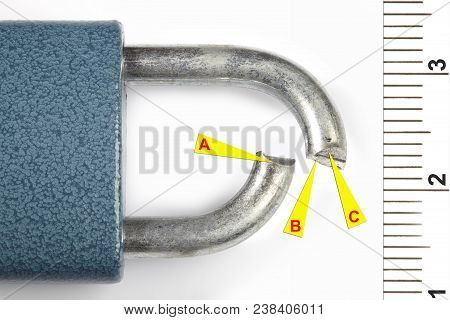 Macro Detail Of Cutted Padlock Documented As Evidence Of Burglary Crime