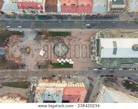 Overtop View Of Square Before Old European Building.