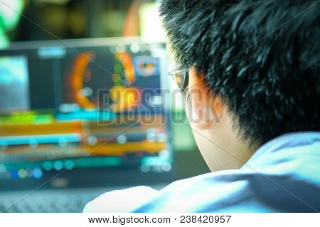 Physician With Coronary Monitor Analysis Machine In Intensive Care Unit