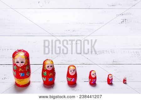 Traditional Russian Wooden Red Dolls Called Matryoshka.