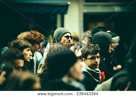 Strasbourg, France  - Mar 22, 2018: Man With Sunglasses In The Middle Of Crowd At Demonstration Prot