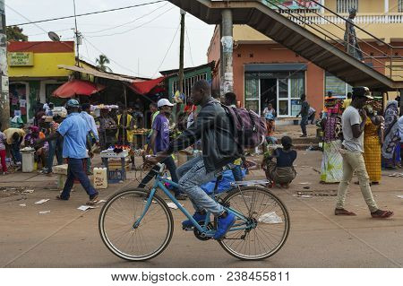 Bissau, Republic Of Guinea-bissau - January 28, 2018: Street Scene In The City Of Bissau With A Man 