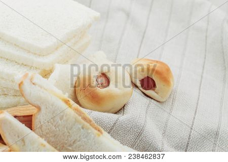 Bread And A Ham On The Tablecloth.