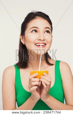 Beautiful Asian Girl With Juice, Isolated On White