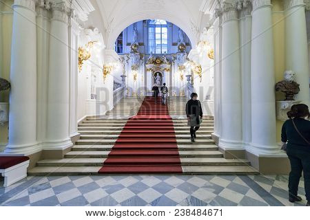 Saint Petersburg, Russia - March 16, 2018: Visitors On Main Stair Of Great Hermitage Museum. The Sta