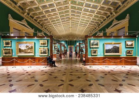 Saint Petersburg, Russia - March 16, 2018: Visitors In Gallery Of Great Hermitage Museum. The State 