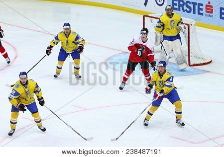 Kyiv, Ukraine - April 25, 2017: Ukrainian Ice-hockey Players (yellow Jersey) Defend Their Net During