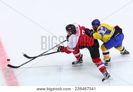 Kyiv, Ukraine - April 25, 2017: Brian Lebler Of Austria (l) Fights For A Puck With Dmytro Nimenko Of