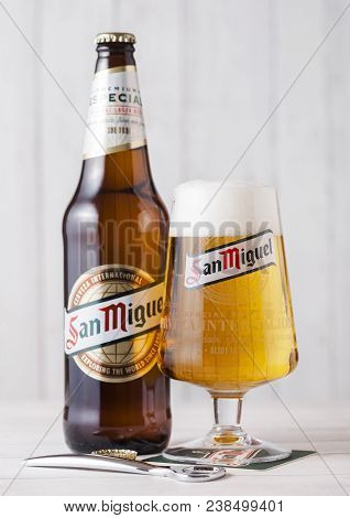 London, Uk - April 27, 2018: Glass Bottle Of San Miguel Lager Beer On Wooden Background With Origina