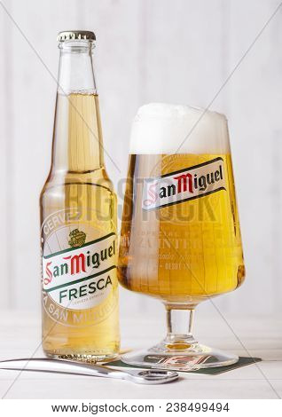 London, Uk - April 27, 2018: Glass Bottle Of San Miguel Fresca Lager Beer On Wooden Background With 