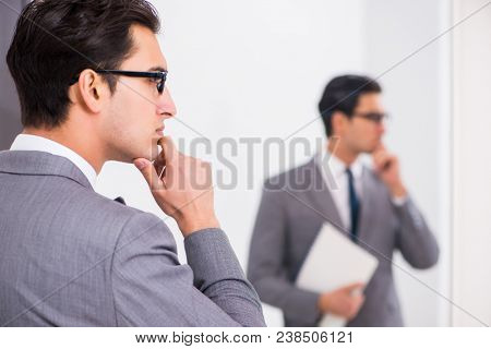 Politician planning speach in front of mirror
