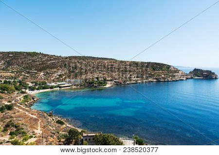 a panoramic view over the Spiaggia di Calamosca beach in Cagliari, Sardinia, Italy