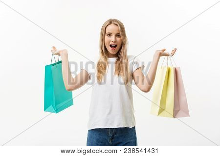 Shopping And Lifestyle Concept: Young Happy Summer Shopping Woman Smiling And Holding Shopping Bags 