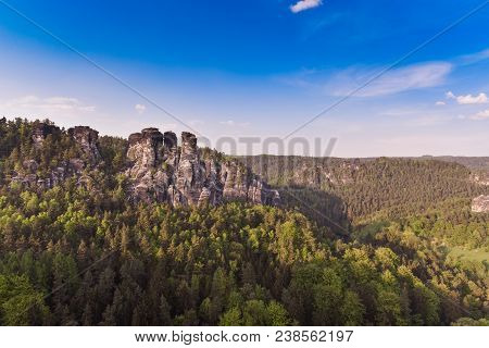 Bastei Rocks In Swiss Saxony, Around The Ruins Of Neurathen Castle. Germany In Summer