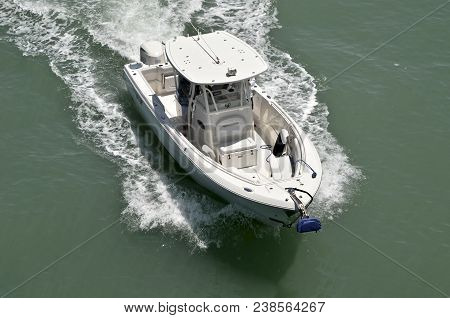 Open Sport Fishing Boat Powered By A Single Outboard Engine.