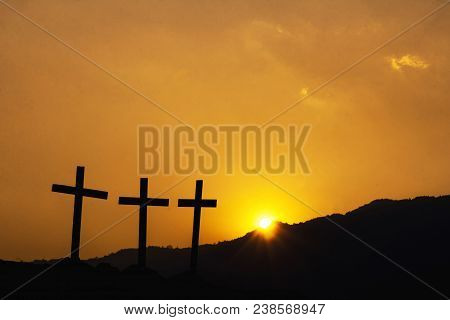 Crucifixion Of Jesus Christ., Three Cross Silhouette On The Mountain At Sunset