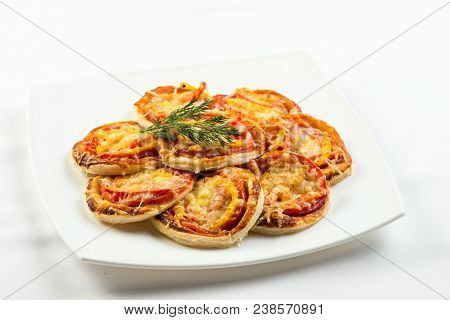 Mix Of Mini Pizzas On A Stone Try On White Background