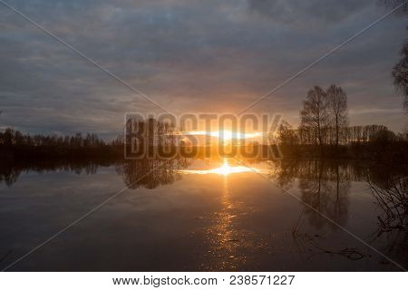 Sunset On The Lake On A Warm Spring Evening
